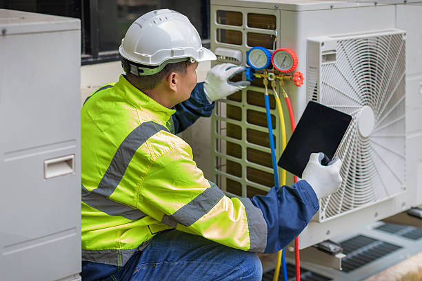 Professional Hvac Maintenance technician working in Norwood, MA